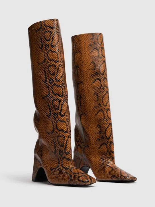 Coperni   85mm Snake print leather bridge boots 