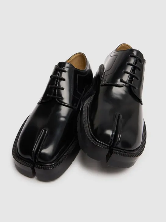 Maison Margiela   County leather lace-up tabi shoes 